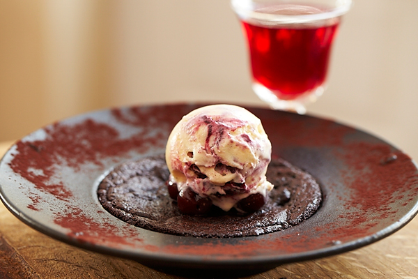 Warm Chocolate, Sloe Gin and Juniper Pudding with Damson Ripple Ice Cream